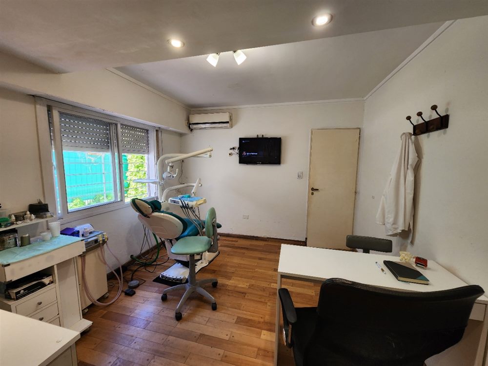 Box de atención con sillón odontológico